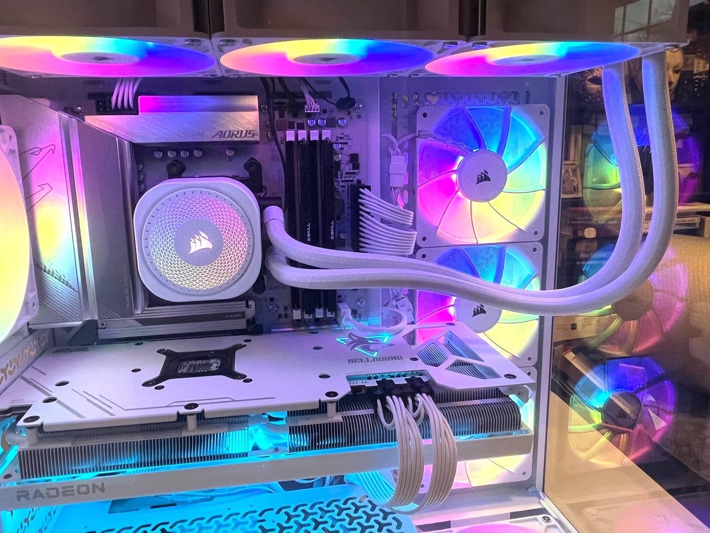 White gaming PC with a Hellhound Radeon card and Corsair RGB fans